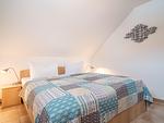 Schlafzimmer mit Doppelbett - Wohnung 5-73 - Top-Hundeurlaub