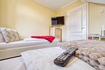 Schlafzimmer mit zwei Einzelbetten - 23 - Wohnung Boddenstern - Top-Hundeurlaub