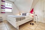 Schlafzimmer mit Doppelbett - 23 - Wohnung Boddenstern - Top-Hundeurlaub