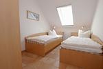 Schlafzimmer mti Einzelbetten - Wohnung 5-71 - Top-Hundeurlaub