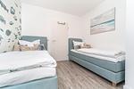 Schlafzimmer mit zwei Einzelbetten - Wohnung HF 23 - "Viento" - Top-Hundeurlaub