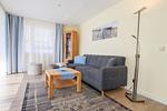 Wohnbereich mit Sofa - Wohnung 2-33 - Top-Hundeurlaub