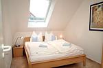 Schlafzimmer mit Doppelbett - Wohnung 1-18 - Top-Hundeurlaub