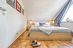 Schlafzimmer mit Doppelbett - Seeschwalbe - Wohnung 4-62 - Top-Hundeurlaub