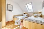 Schlafzimmer mit zwei Einzelbetten - Seeschwalbe - Wohnung 4-62 - Top-Hundeurlaub