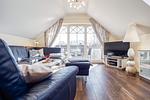 Wohnbereich mit Sofa, Sessel und TV - Neue Reihe 28 - Wohnung Vogelnest - Top-Hundeurlaub