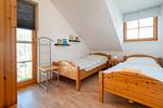 Schlafzimmer mit zwei Einzelbetten - Reihenhaus 7b - Meerzeit - Top-Hundeurlaub
