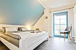 Schlafzimmer mit Doppelbett - Doppelhaushälfte 11a - Schwalbennest - Top-Hundeurlaub