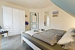Schlafzimmer mit Doppelbett - Doppelhaushälfte 11a - Schwalbennest - Top-Hundeurlaub