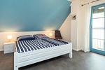 Schlafzimmer mit Doppelbett - Doppelhaushälfte 11a - Schwalbennest - Top-Hundeurlaub