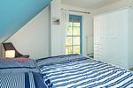Schlafzimmer mit Doppelbett - Doppelhaushälfte 11a - Schwalbennest - Top-Hundeurlaub