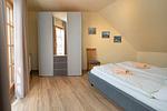 Schlafzimmer mit Doppelbett - Wohnung 4.6 - Boddenblick - Top-Hundeurlaub