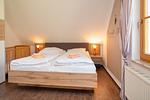 Schlafzimmer mit Doppelbetten - Wohnung 3.6 - Frieda - Top-Hundeurlaub