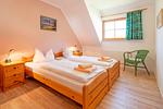 Schlafzimmer mit Doppelbett - Wohnung 1.5 - Amber - Top-Hundeurlaub