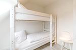 Deichlodge, Lodge.drei, Schlafzimmer 2 mit Etagenbett - deichlodge, lodge.drei - Top-Hundeurlaub