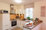 Küche / Küchenzeile - Ferienhaus Haubenlerche 52 - Top-Hundeurlaub