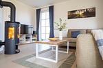 Wohnzimmer - Ferienhaus Schilfrohrsänger 6 - Top-Hundeurlaub