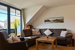 Wohnzimmer mit Sitzgruppe - Wohnung 08-7 - Top-Hundeurlaub