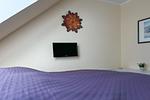 TV im ersten Schlafzimmer - Wohnung 08-7 - Top-Hundeurlaub