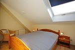 drittes Schlafzimmer mit Doppelbett - Wohnung 15-5 - Top-Hundeurlaub