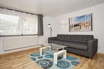 Wohnzimmer - Ferienhaus: Terrasse und Gartennutzung, Sauna- u. Schwimmbadnutzung - Top-Hundeurlaub