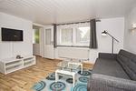 Wohnzimmer - Ferienhaus: Terrasse und Gartennutzung, Sauna- u. Schwimmbadnutzung - Top-Hundeurlaub