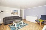 Wohnzimmer - Ferienhaus: Terrasse und Gartennutzung, Sauna- u. Schwimmbadnutzung - Top-Hundeurlaub