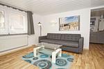 Wohnzimmer - Ferienhaus: Terrasse und Gartennutzung, Sauna- u. Schwimmbadnutzung - Top-Hundeurlaub