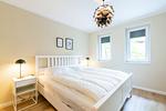erstes Schlafzimmer mit Doppelbett - Wohnung 03 - Top-Hundeurlaub