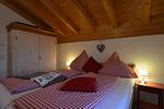 Schlafzimmer - Bunte Kuh -  Feriendorf Via Claudia Haus 52 - Top-Hundeurlaub