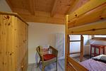 Schlafzimmer - Bunte Kuh -  Feriendorf Via Claudia Haus 52 - Top-Hundeurlaub