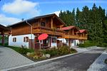 Hauptansicht - Bunte Kuh -  Feriendorf Via Claudia Haus 52 - Top-Hundeurlaub