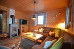 Wohnzimmer - Waldromantik - Feriendorf Via Claudia Haus 75 - Top-Hundeurlaub