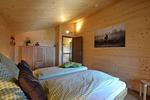 Schlafzimmer - Waldromantik - Feriendorf Via Claudia Haus 75 - Top-Hundeurlaub