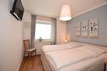 Schlafzimmer - Wohnung 2.19 - Top-Hundeurlaub