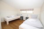 Schlafzimmer 1 OG - Haus Lachmöwe, Susanne-Fischer Weg 19 - Top-Hundeurlaub