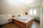 Schlafzimmer 2 im OG mit Doppelbett - Am Golfplatz 4 - Top-Hundeurlaub