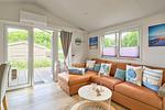 Wohnzimmer - „Ostseeperle“ – eingezäunt, mit Klimaanlage & Trampolin 29 - Top-Hundeurlaub