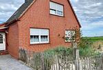 Fassade / Eingang - Mariechen am Meer Whg.1 - Norddeich - Top-Hundeurlaub