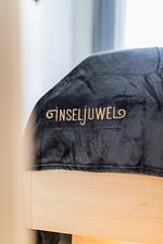 Dekoratives Detail - Inseljuwel - Jade - Top-Hundeurlaub