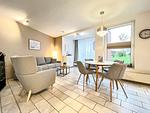 Wohnzimmer mit Blick zur Terrasse - Wohnung 070 - EG - Top-Hundeurlaub