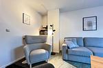 gemütlicher Sessel im Wohnzimmer - Wohnung 070 - OG - Top-Hundeurlaub