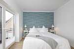 Schlafzimmer - Ferienhaus Küstenglück Frieda - Top-Hundeurlaub
