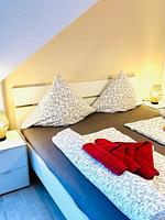 Schlafzimmer - Ferienwohnung Caroline - Top-Hundeurlaub