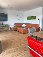 Wohnzimmer - Ferienhaus Seeperle Traumblick 7a - Top-Hundeurlaub