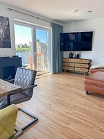 Wohnzimmer - Ferienhaus Seeperle Traumblick 7a - Top-Hundeurlaub