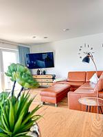 Wohnzimmer - Ferienhaus Seeperle Traumblick 7a - Top-Hundeurlaub
