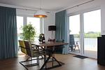 Wohnzimmer - Ferienhaus Seeperle Traumblick 7a - Top-Hundeurlaub