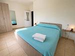das Doppelbett-Schlafzimmer mit Platz für Kinderbett - Moretta - Top-Hundeurlaub