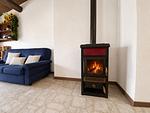 der gemütliche Kamin in Wohnbereich - Moretta - Top-Hundeurlaub
